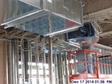 Installing ductwork at the 4th floor Facign South.jpg